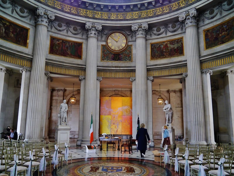 The Rotunda of Dublin City Hall set out with rows of chairs for a wedding ceremony