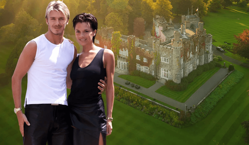 A couple posing in front of an aerial view of Luttrellstown Castle