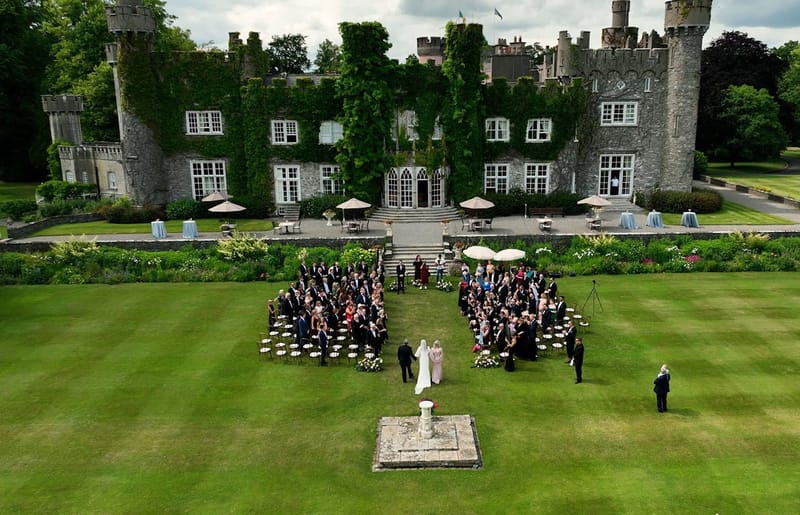 Guests seated for an outdoor wedding ceremony at Luttrellstown Castle